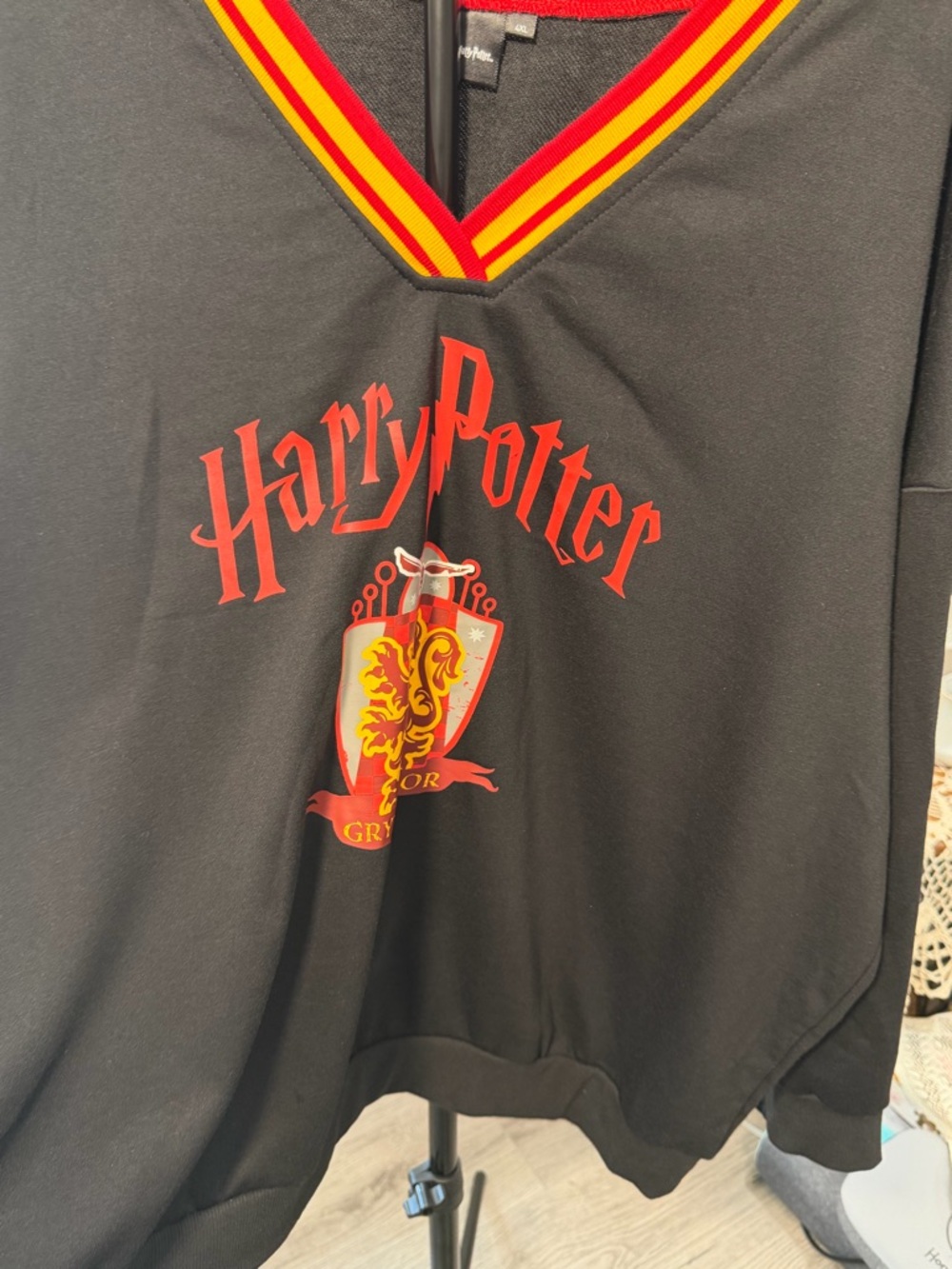 Warner Bros. Harry Potter Black Sweatshirt with Red and Yellow Trim - Picture 1 of 4